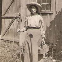 Miss Jennie Macomber circa 1927, as she often appeared when doing her beloved gardening.